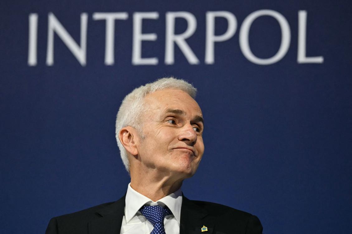 Interpol Secretary General Jurgen Stock reacts during the press conference on the opening day of the Interpol general assembly, in Glasgow on November 4, 2024. (AFP)