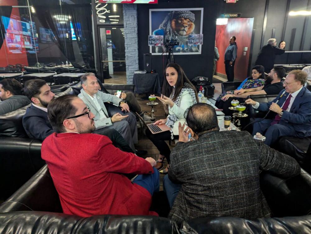 Supporters of Donald Trump attend a late night hookah bar election watch party in Dearborn, Michigan, on November 6, 2024. (AFP)