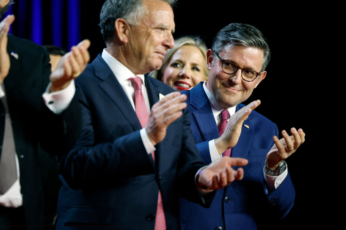 Speaker of the House Mike Johnson applauds as Republican presidential nominee, former US President Donald Trump holds an election night event at the Palm Beach Convention Center on Nov. 6, 2024 in West Palm Beach, Florida. (Getty Images/AFP)