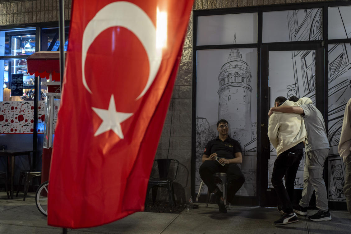 The flag of Turkey hangs as workers take a break from the dinner shift at a Turkish restaurant Wednesday, Nov. 6, 2024, in Dearborn, Mich., the nation's largest Arab-majority city. (AP)