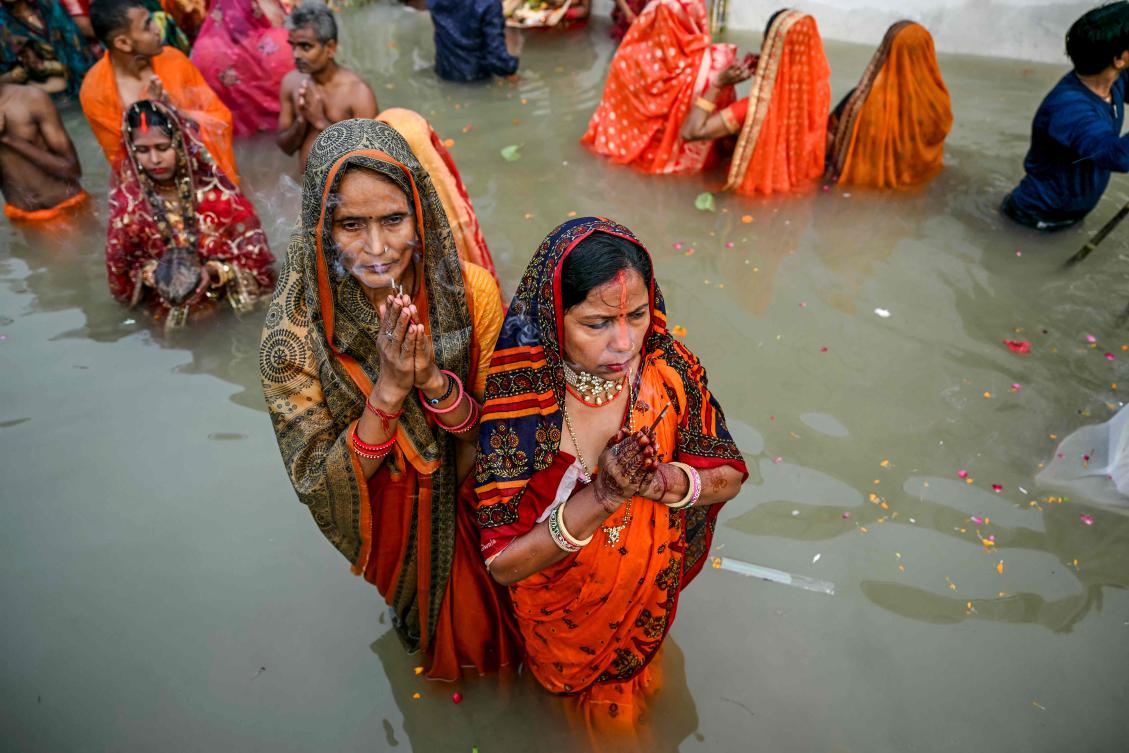 New Delhi’s authorities have poured in anti-foaming agents to disperse froth from the sewage-filled Yamuna river, and used nets to sweep the scum away – but it has done nothing to clean the fetid water itself. (AFP)