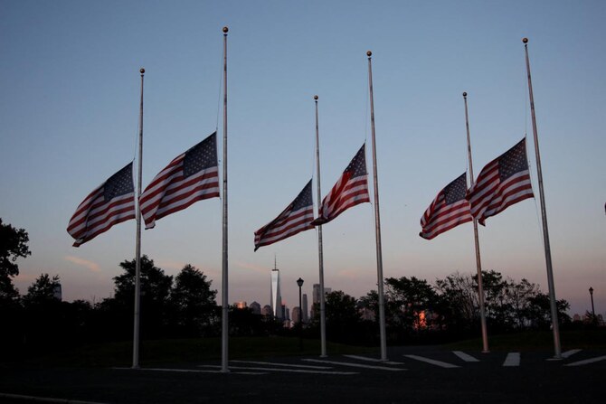 In this file photo, taken on September 11, 2024, US national flags are flown at half-staff on the 23rd anniversary of the 9/11 attacks on the World Trade Center in Jersey City, New Jersey. (AFP/File)