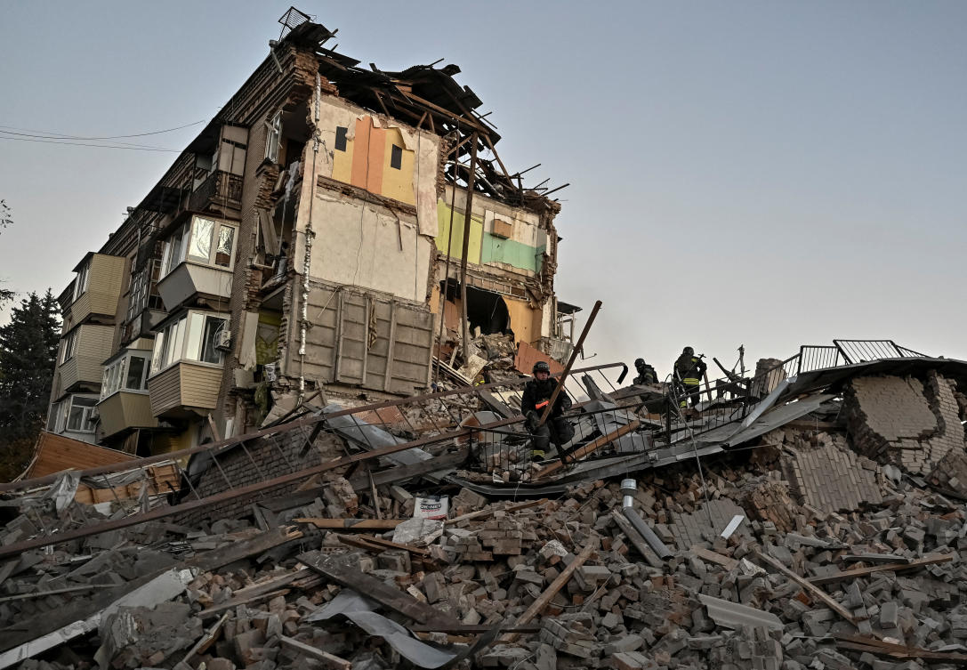 Rescuers work at a site of an apartment building hit by a Russian air strike, in Zaporizhzhia, Ukraine Nov. 7, 2024. (Reuters)