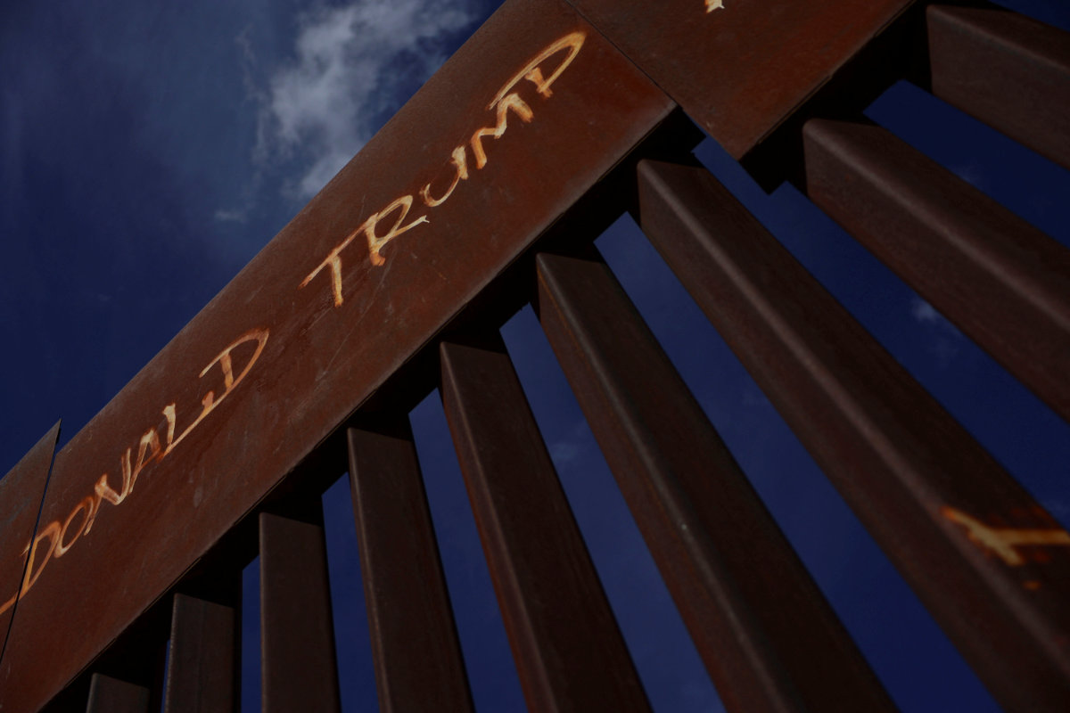 "Donald Trump" is written on top of the wall at the border between the US and Mexico, in Ciudad Juarez, Mexico, on Nov. 6, 2024. (REUTERS)