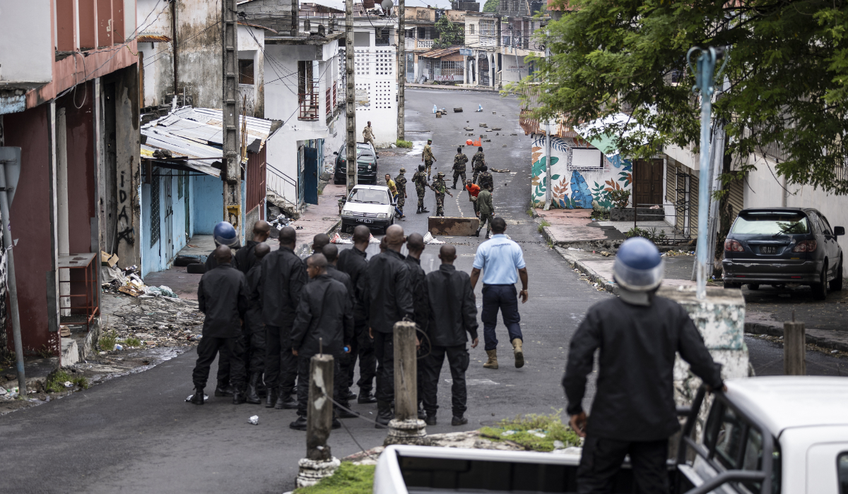 Comoros Police officers and Comoros soldiers patrol in Moroni on January 17, 2024. (AFP)