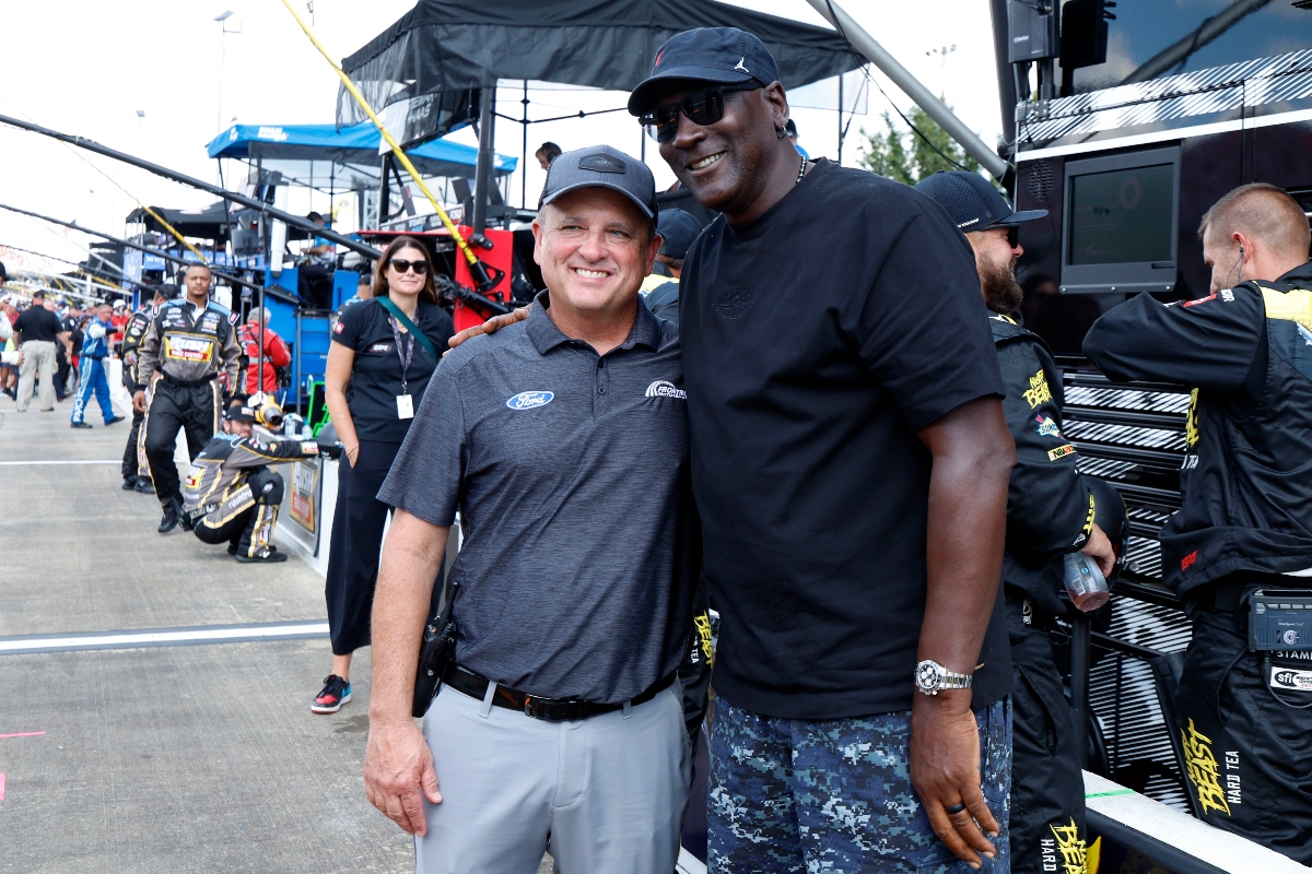 Bob Jenkins, owner of Front Row Motorsports, and Michael Jordan, co-owner of 23XI Racing, pose before a NASCAR Cup Series auto race at Talladega Superspeedway, Oct. 6, 2024, in Talladega, Ala. (File/AP )