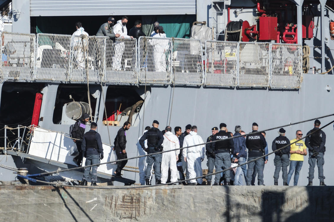 Migrants disembark from the Italian navy ship Libra at the port of Shengjin, northwestern Albania, on Nov. 8, 2024, as a second group of eight migrants intercepted in international waters is processed in a reception facility despite the failure with the first group in October. (AP)