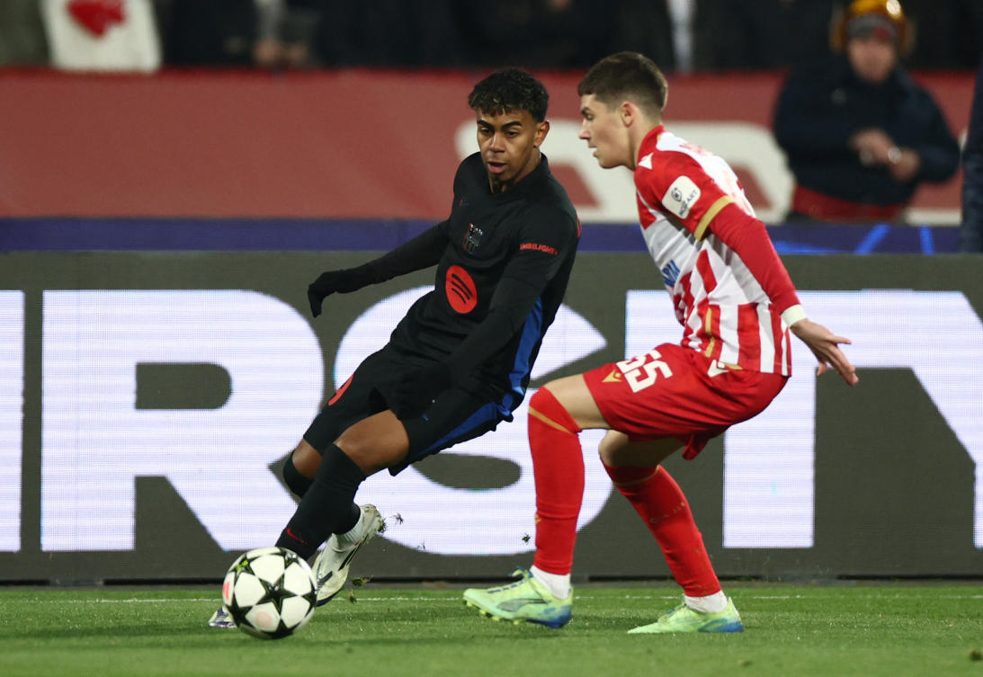 FC Barcelona’s Lamine Yamal in action with Crvena Zvezda’s Andrija Maksimovic during their Champions League match at Rajko Mitic Stadium, Belgrade, on Nov. 6, 2024. (Reuters)
