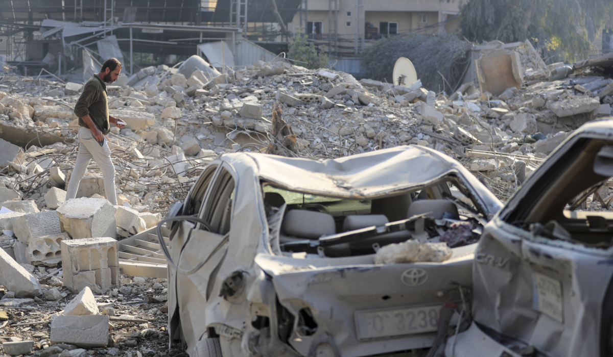 A resident checks the site of an Israeli airstrike in Tyre, southern Lebanon, Saturday, Nov. 9, 2024. (AP)