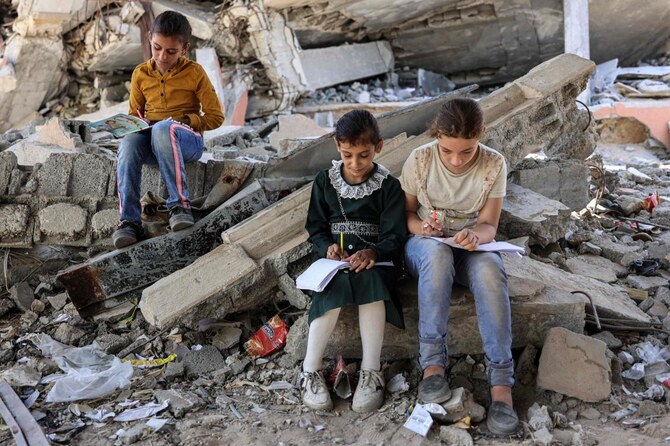 At least 64 attacks targeting schools were reported in the Gaza Strip last month, averaging nearly two incidents per day, according to data from UNICEF. (AFP/File Photo)