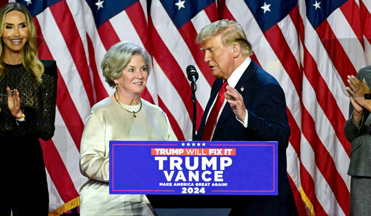 Former US President and Republican presidential candidate Donald Trump greets his campaign manager Susie Wiles (L) during an election night event at the West Palm Beach Convention Center in West Palm Beach, Florida, on November 6, 2024. (AFP)