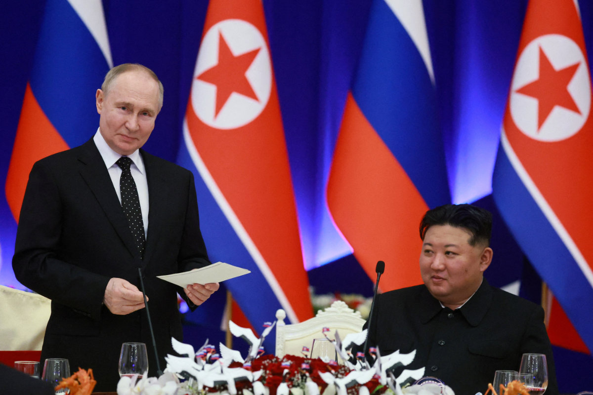 Russia's President Vladimir Putin and North Korea's leader Kim Jong Un attend a state reception in Pyongyang, North Korea, on June 19, 2024. (Sputnik/Pool via REUTERS/File)