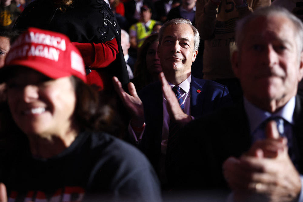 Above, Reform UK party leader Nigel Farage attends former President Donald Trump’s campaign rally at the Santander Arena on Nov. 04, 2024 in Reading, Pennsylvania. (Getty Images via AFP)