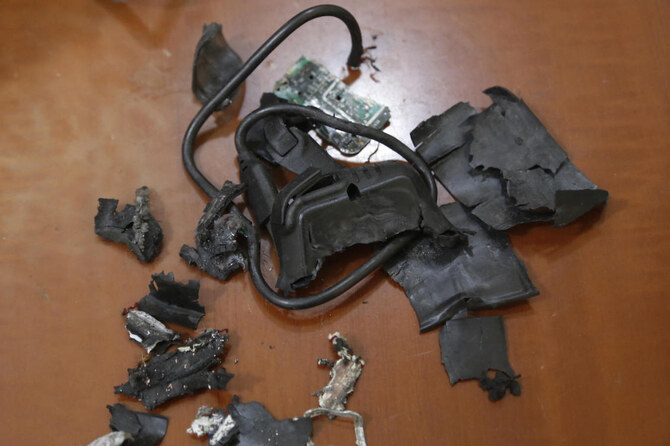 A photo taken on September 18, 2024, in Beirut’s southern suburbs shows the remains of exploded pagers on display at an undisclosed location. (AFP/File)