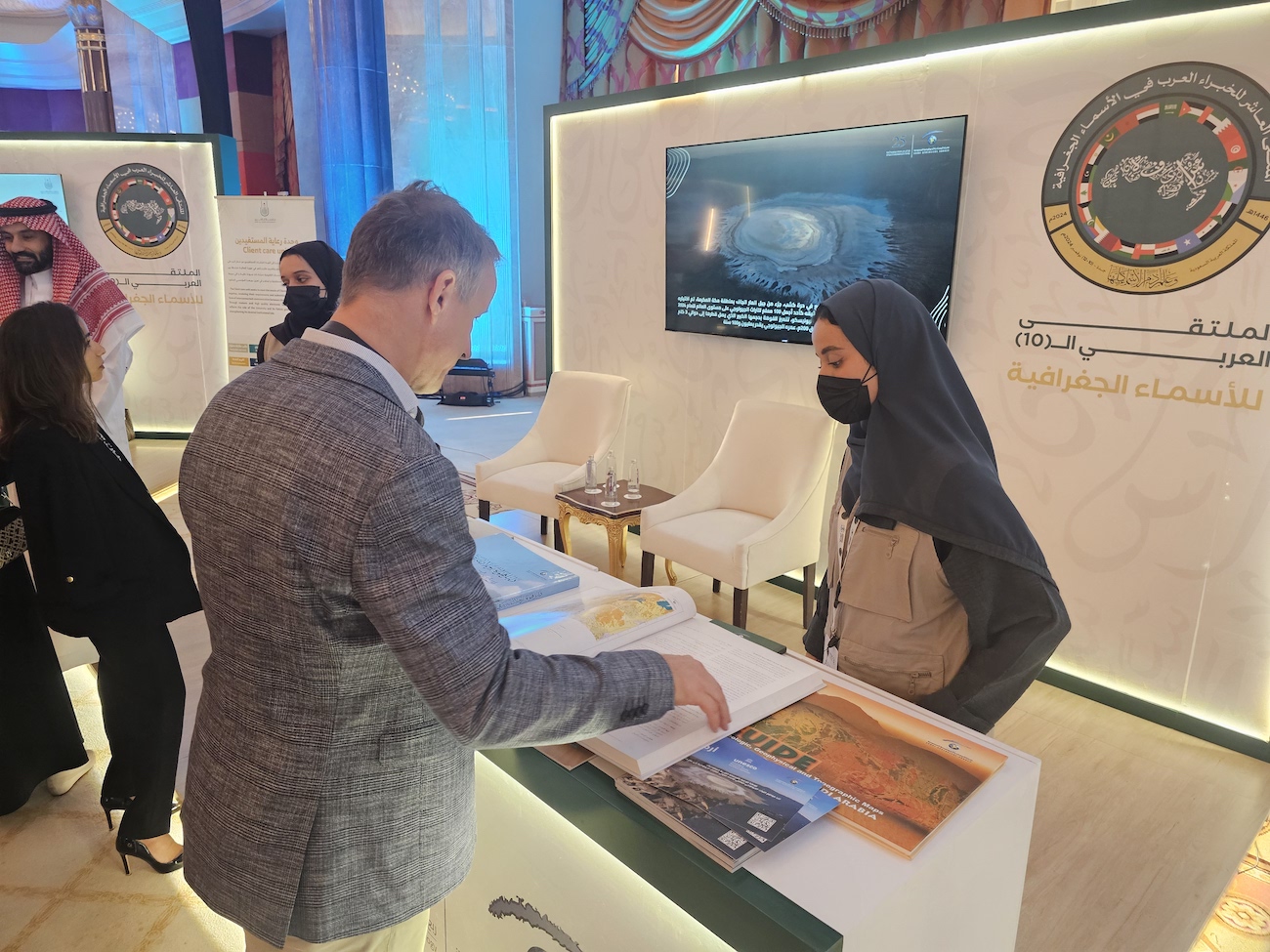 An attendee visits an exhibition at the 10th Forum of the Arab Division of Experts in Geographical Names. (AN photo)