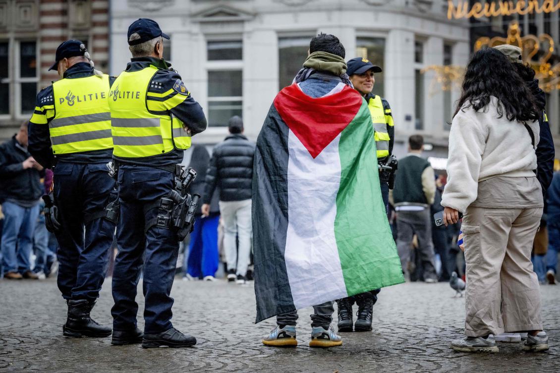 Netherlands' Police officers stand by as people gather during a small pro-Palestinian demonstration on Dam Square in Amsterdam, on November 9, 2024. (FILE/AFP)