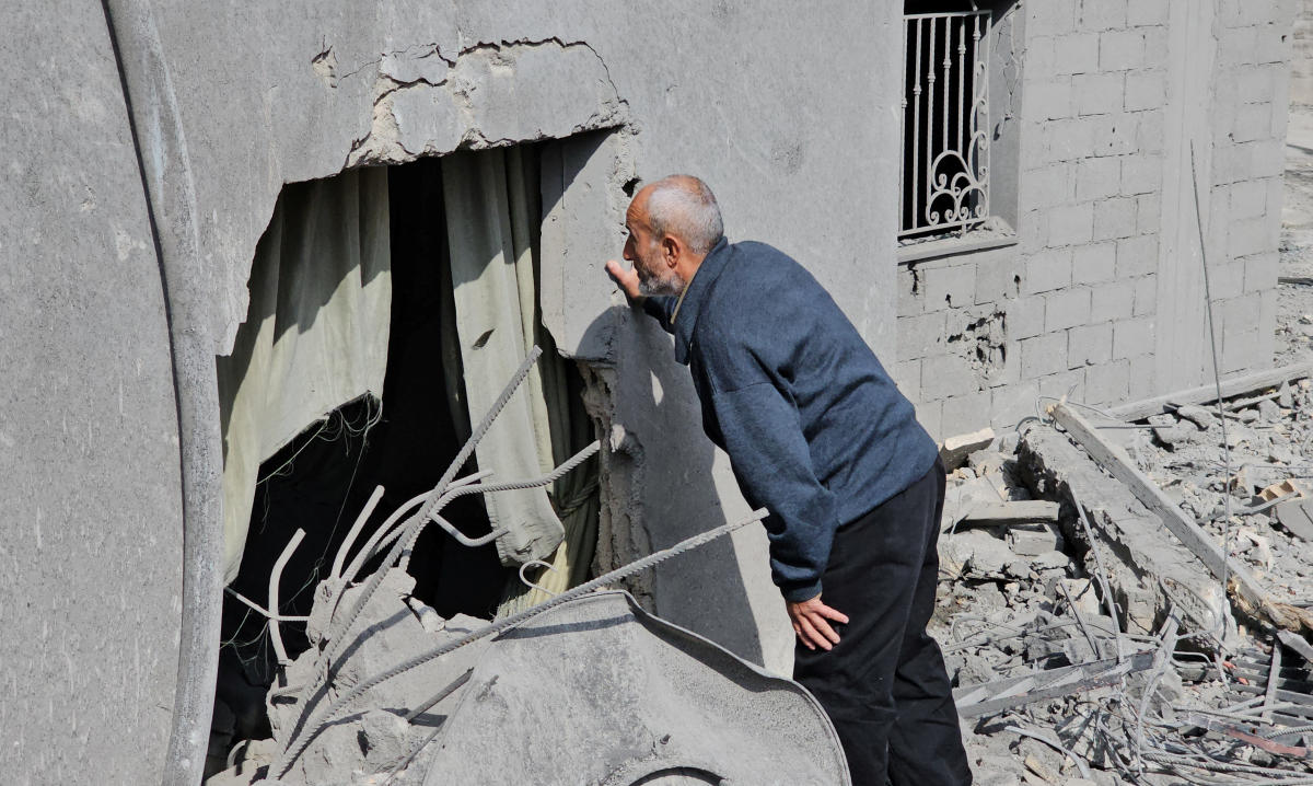 A man inspects his damaged house, in the aftermath of an Israeli strike in Sohmor, in the western part of Lebanon's Bekaa Valley, Lebanon November 10, 2024. (Reuters)