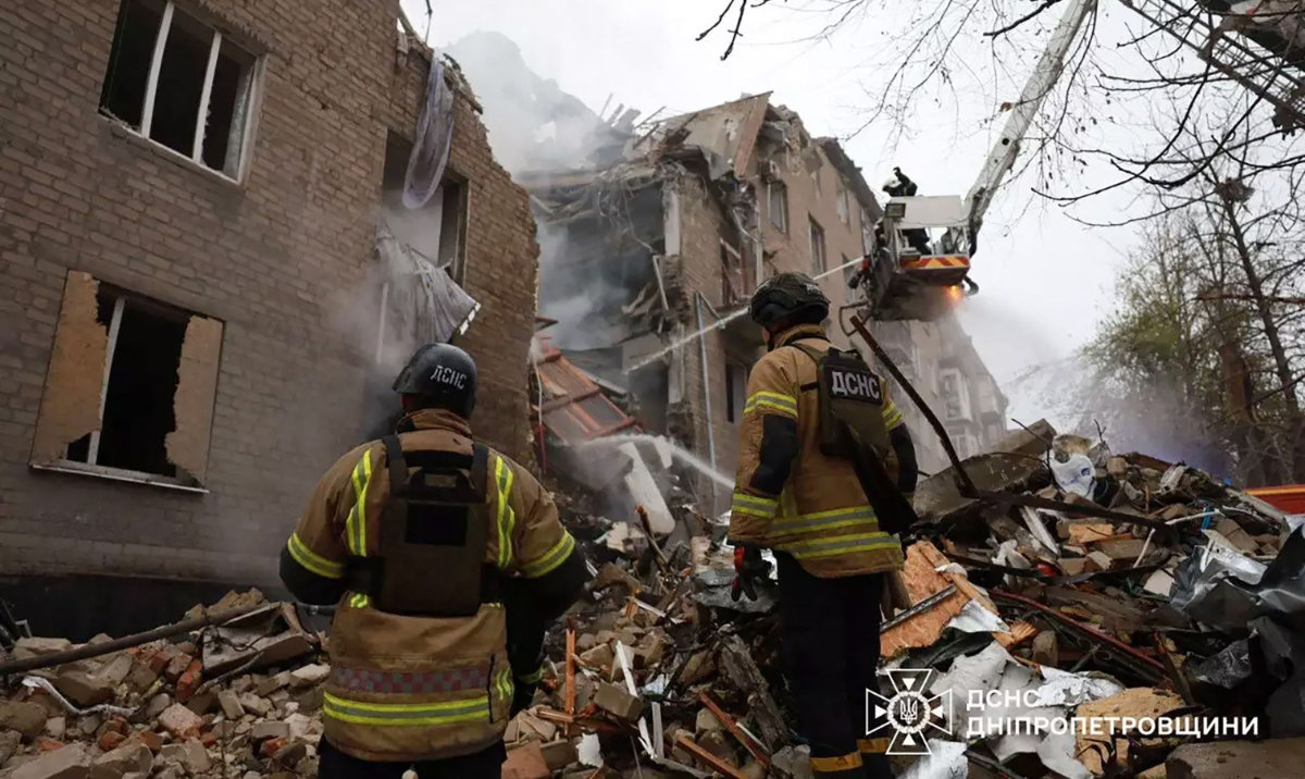 This handout photograph taken and released by the State Emergency Service of Ukraine on November 11, 2024, shows rescuers working at the site of a Russian strike in Kryvyi Rig, Dnipropetrovsk region, amid the Russian invasion of Ukraine. (AFP)