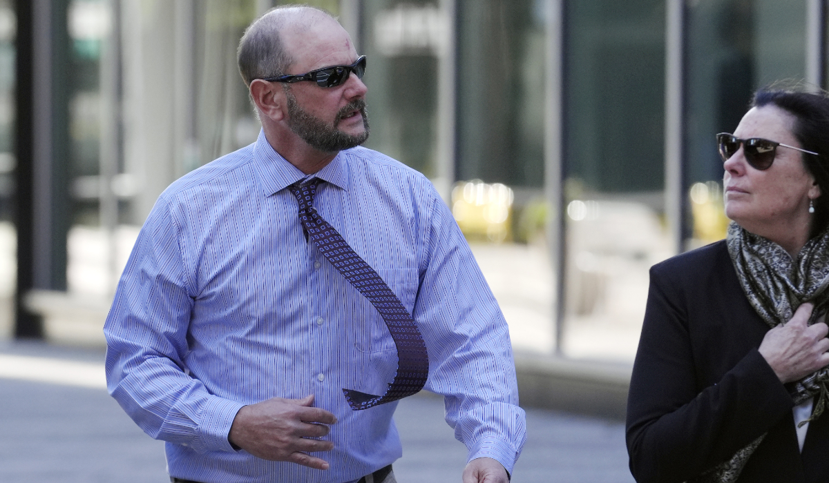 Jack Michael Teixeira, center, father of Massachusetts Air National Guardsman Jack Teixeira. arrives at federal court for his son's sentencing hearing, Tuesday, Nov. 12, 2024, in Boston. (AP)
