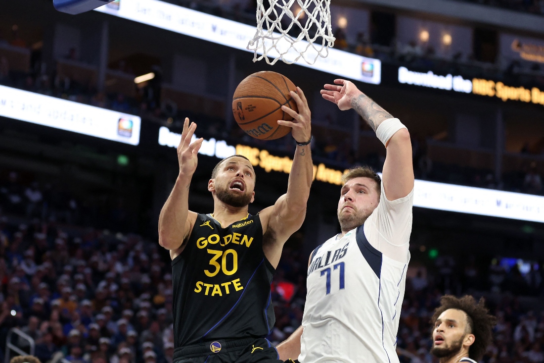 Stephen Curry of the Golden State Warriors goes up for a shot on Luka Doncic of the Dallas Mavericks at Chase Center on Nov. 12, 2024 in San Francisco, California. (Getty Images via AFP)