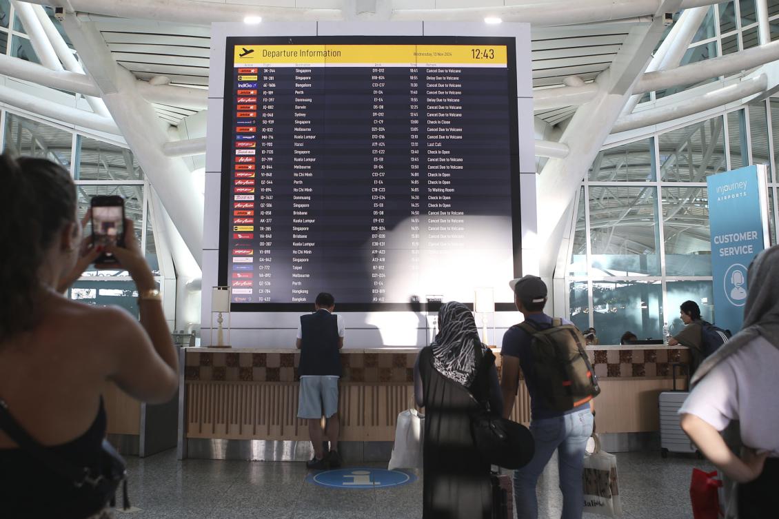 Several international airlines have canceled flights to and from Indonesia’s tourist island of Bali because of an ongoing volcanic eruption. (AP)