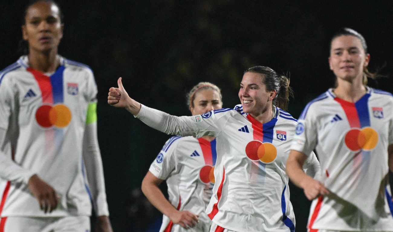 Lyon's Canadian defender #21 Vanessa Gilles (C) celebrates scoring his team's third goal during the Women Champions League football match AS Roma vs Lyon at the Tre Fontane stadium in Rome on November 13, 2024. (AFP)