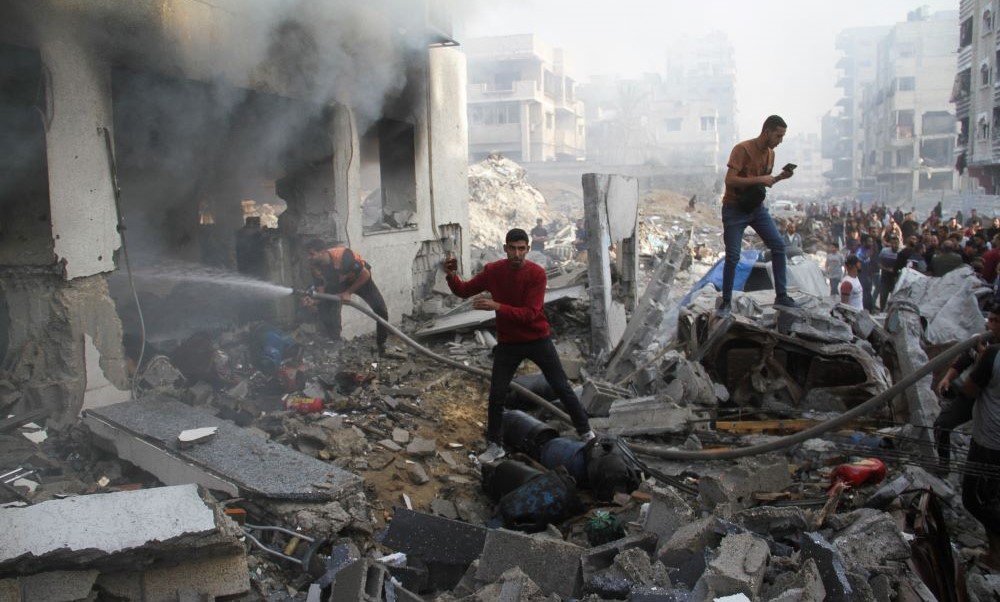 Palestinians inspect the damage at a school sheltering displaced people, after it was hit by an Israeli strike, in Gaza City, Nov. 14, 2024. (Reuters)