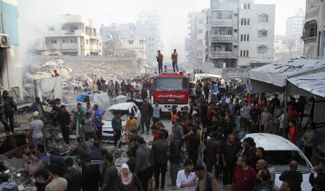 Palestinians inspect the damage at a school sheltering displaced people, after it was hit by an Israeli strike, in Gaza City on November 14, 2024. (REUTERS)