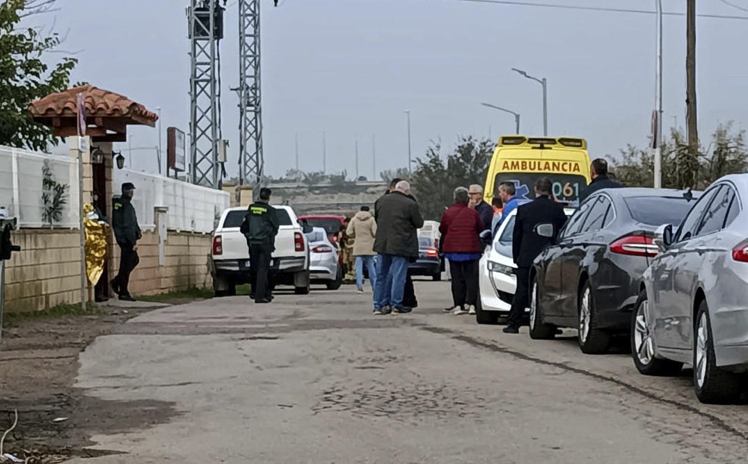 Relatives waiting for news outside the nursing home where least 10 people have died in a fire in Zaragoza, Spain on Nov. 15, 2024. (AP)