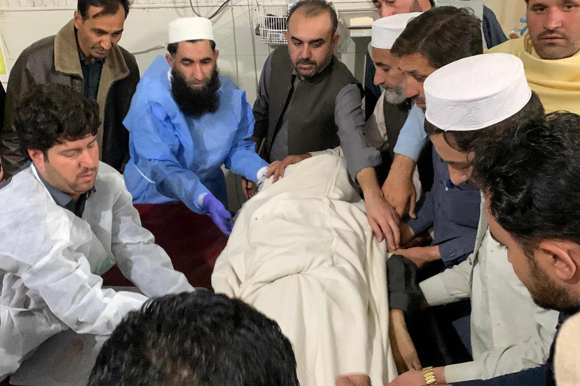Mourners carry the body of politician Sufi Hameed, who was killed by Islamic State Khorasan gunmen in northwest Pakistan on Nov. 14, 2024. (AFP)