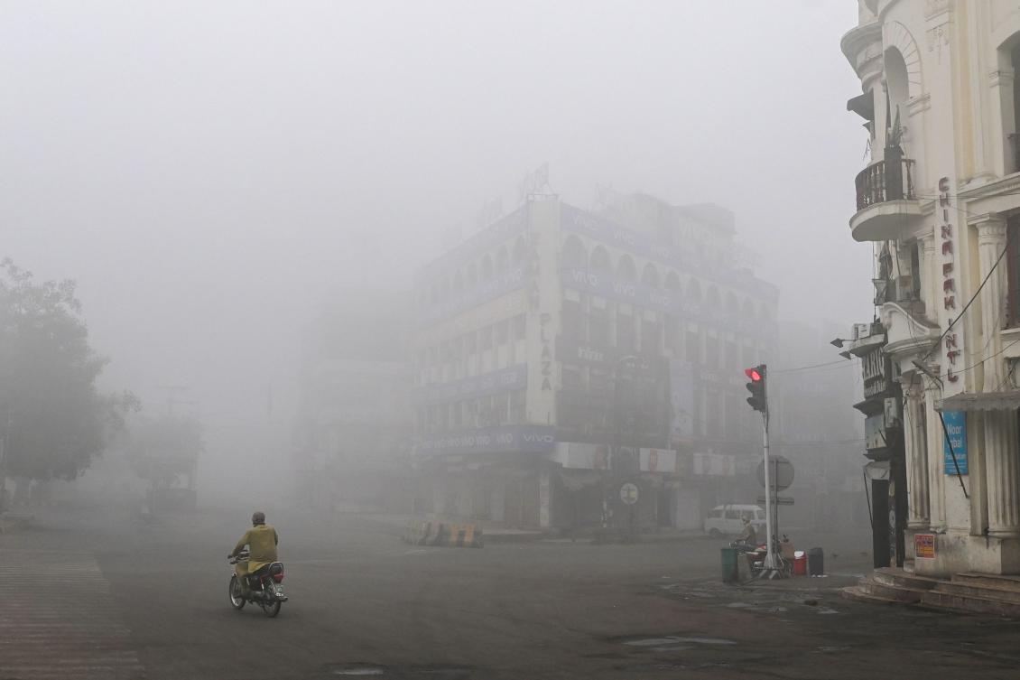 The dangerous smog is a byproduct of large numbers of vehicles, construction and industrial work as well as burning crops at the start of the winter wheat-planting season, experts say. (AFP)
