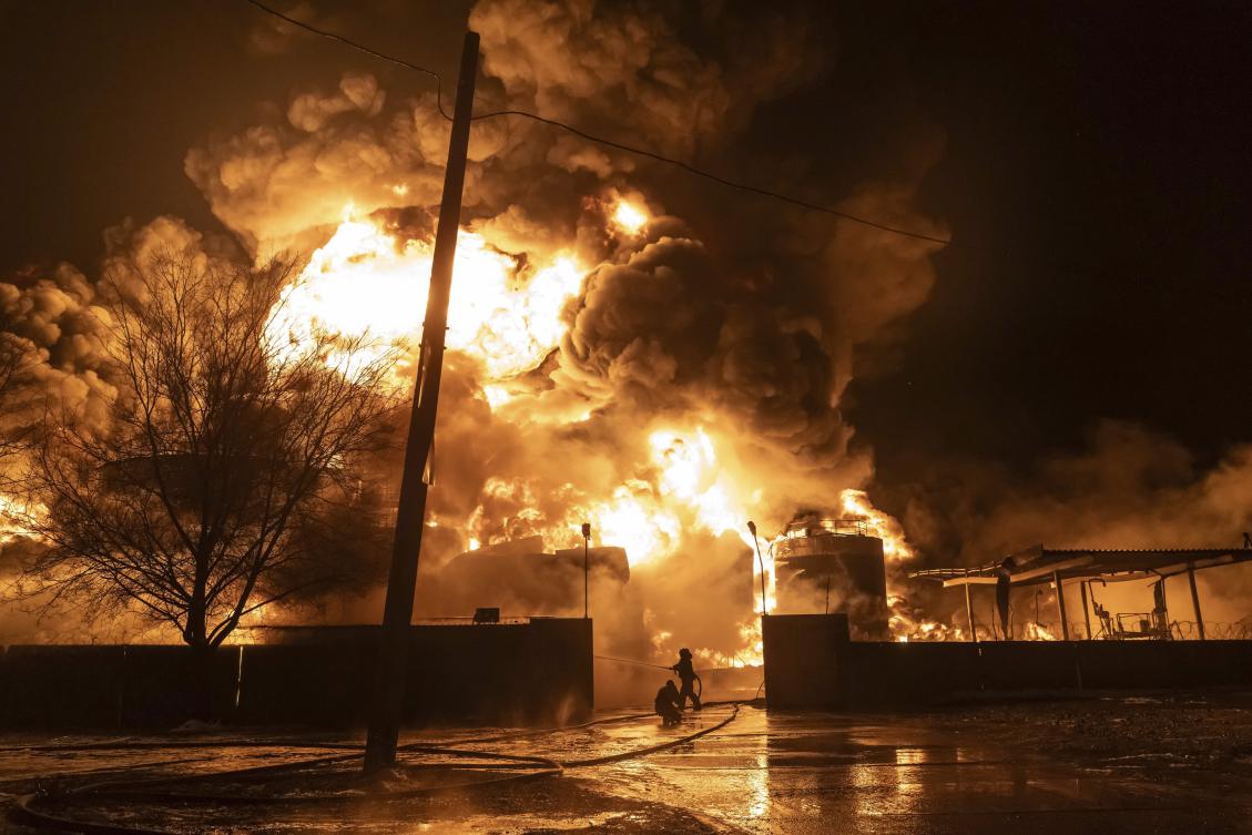 Firefighters extinguish a fire after a Russian attack on a residential neighborhood in Kharkiv, Ukraine Saturday, Feb. 10, 2024. (AP)