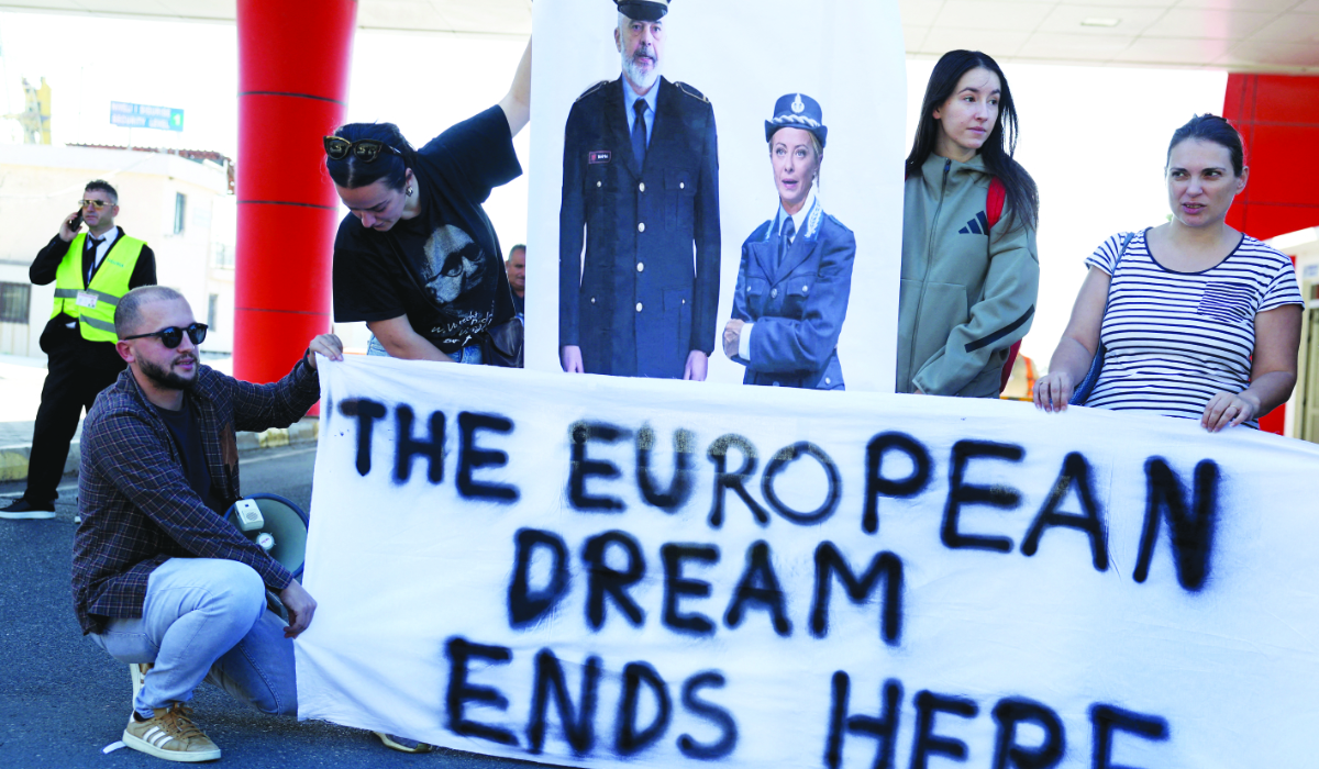 Activists stage a demonstration in Shengjin, Albania. (Reuters)