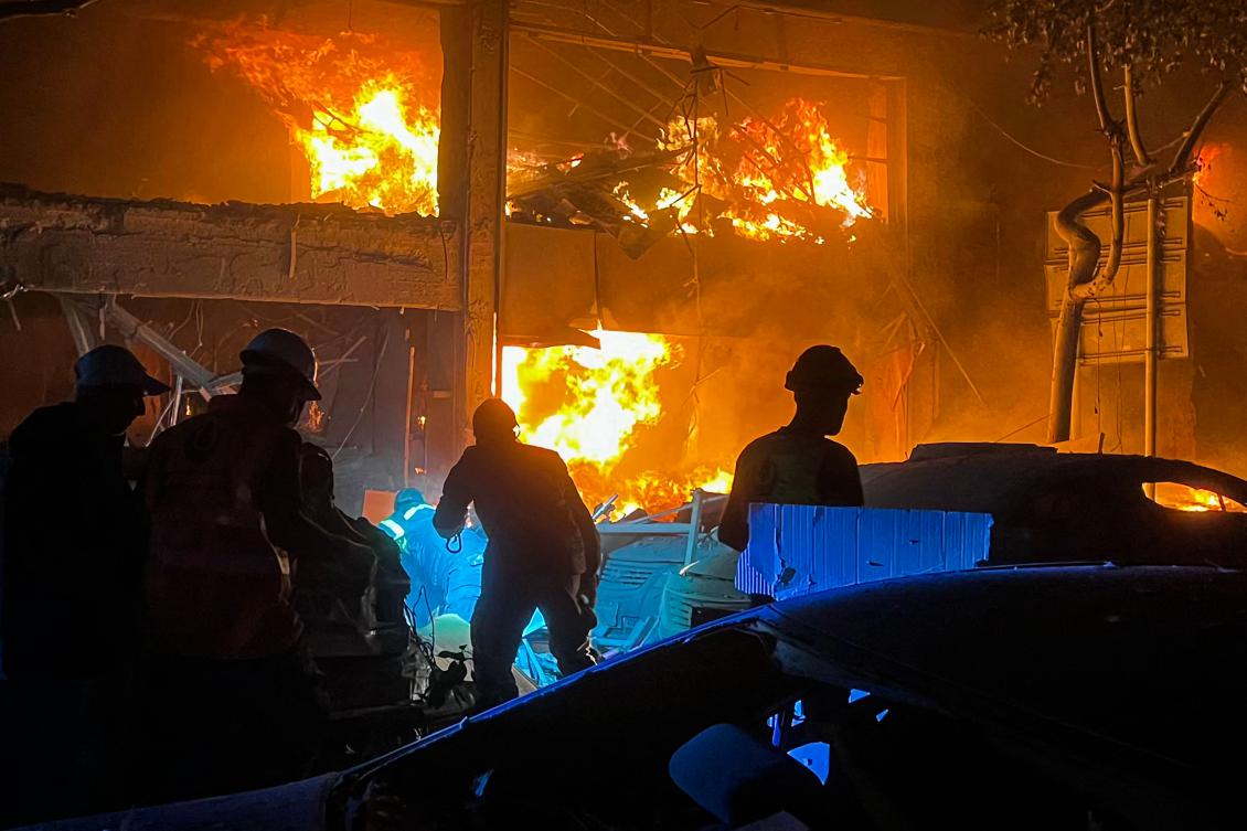 Lebanese emergency services battle a fire burns at the site of an Israeli strike that targeted a building in Beirut’s Mar Elias street on November 17, 2024. (AFP)