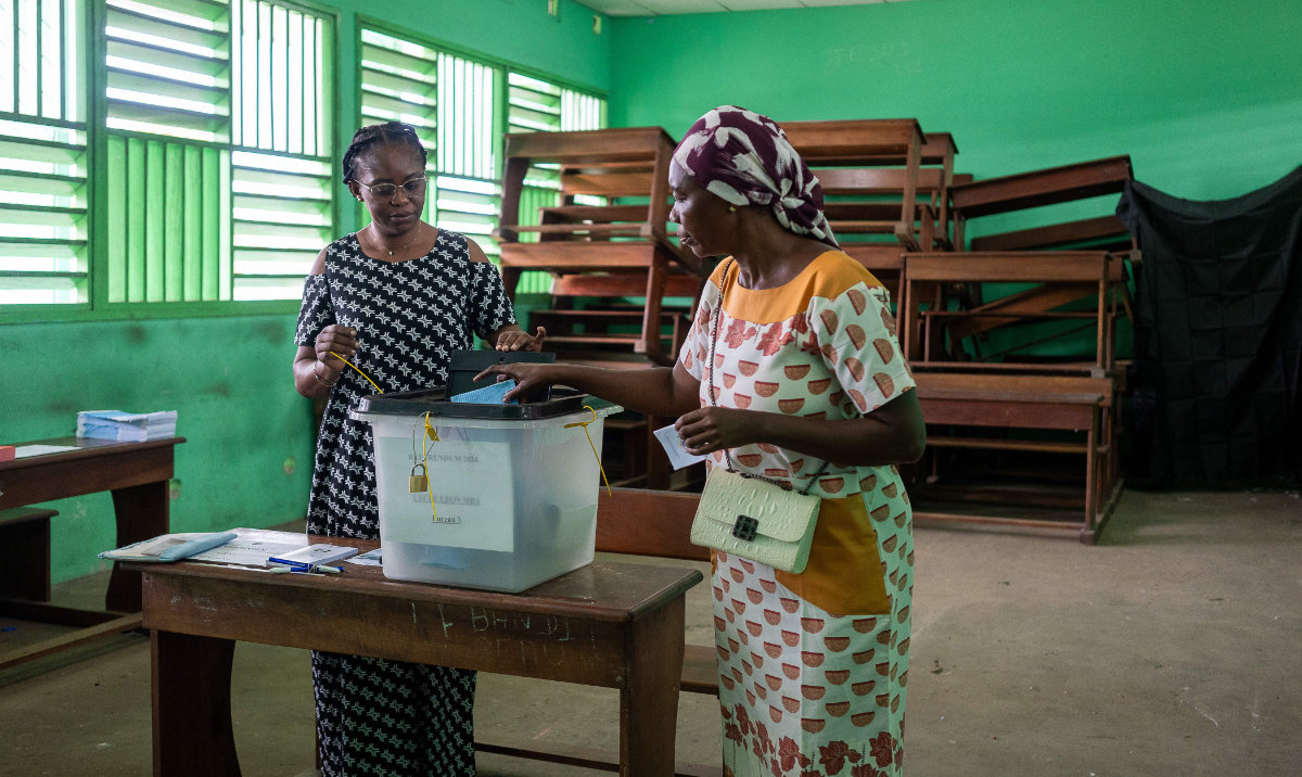 A voter casts her ballot at a polling station during Gabon’s referendum in Libreville, on November 16, 2024. (AFP)