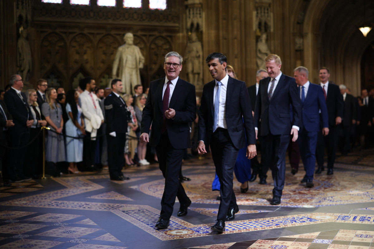 Britain's ruling Conservative Party led by then PM Rishi Sunak (R) lost badly to the main opposition party Labour led by MP Keir Starmer, who eventually became the new prime minister. (AFP/File)