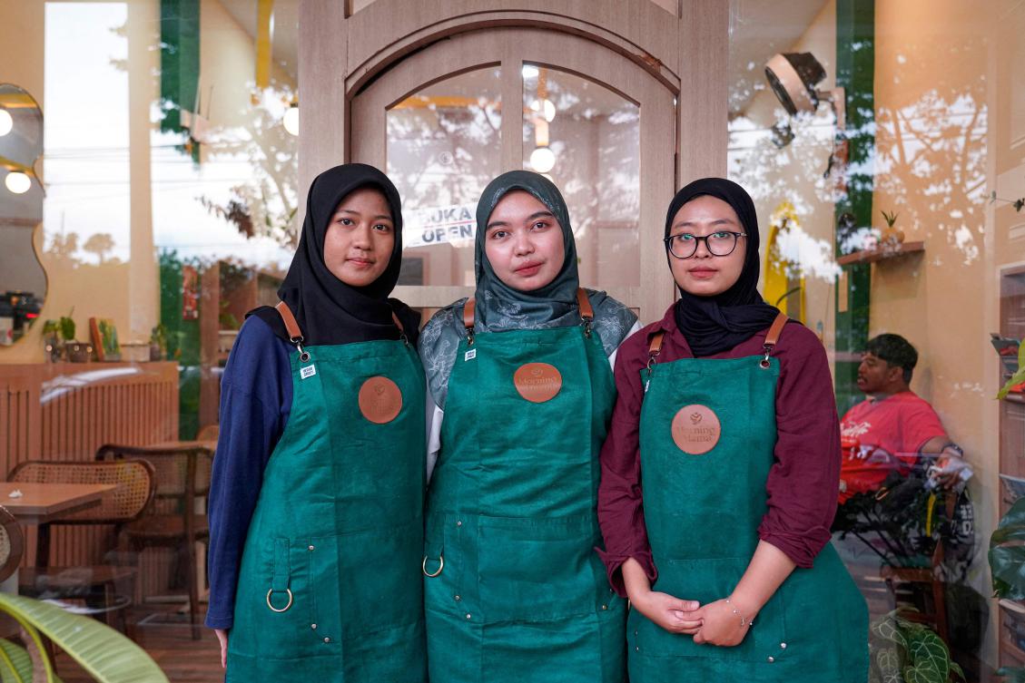 Qurrata Ayuni opened Morning Mama -- which she says is the lone woman-run cafe in Aceh's provincial capital -- last year to create a space for women in a city where such shops have long catered to men. (AFP)