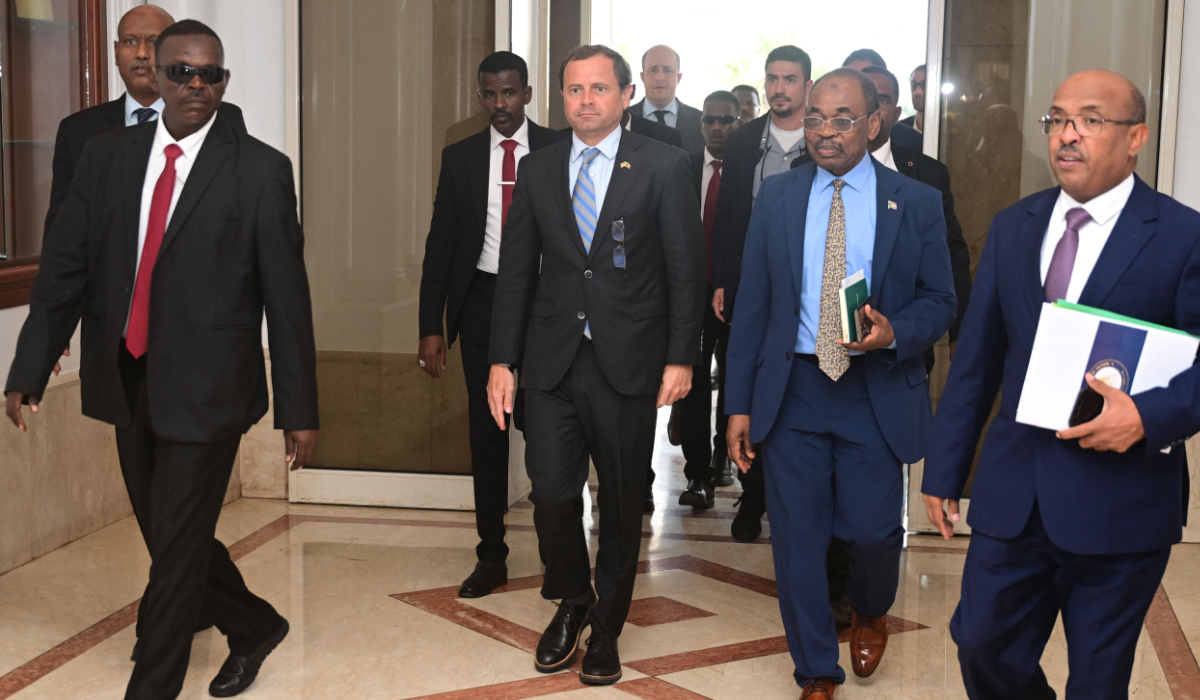 US Special Envoy for Sudan Tom Perriello (C) is welcomed by local officials upon his arrival in Port Sudan on November 18, 2024. (AFP)