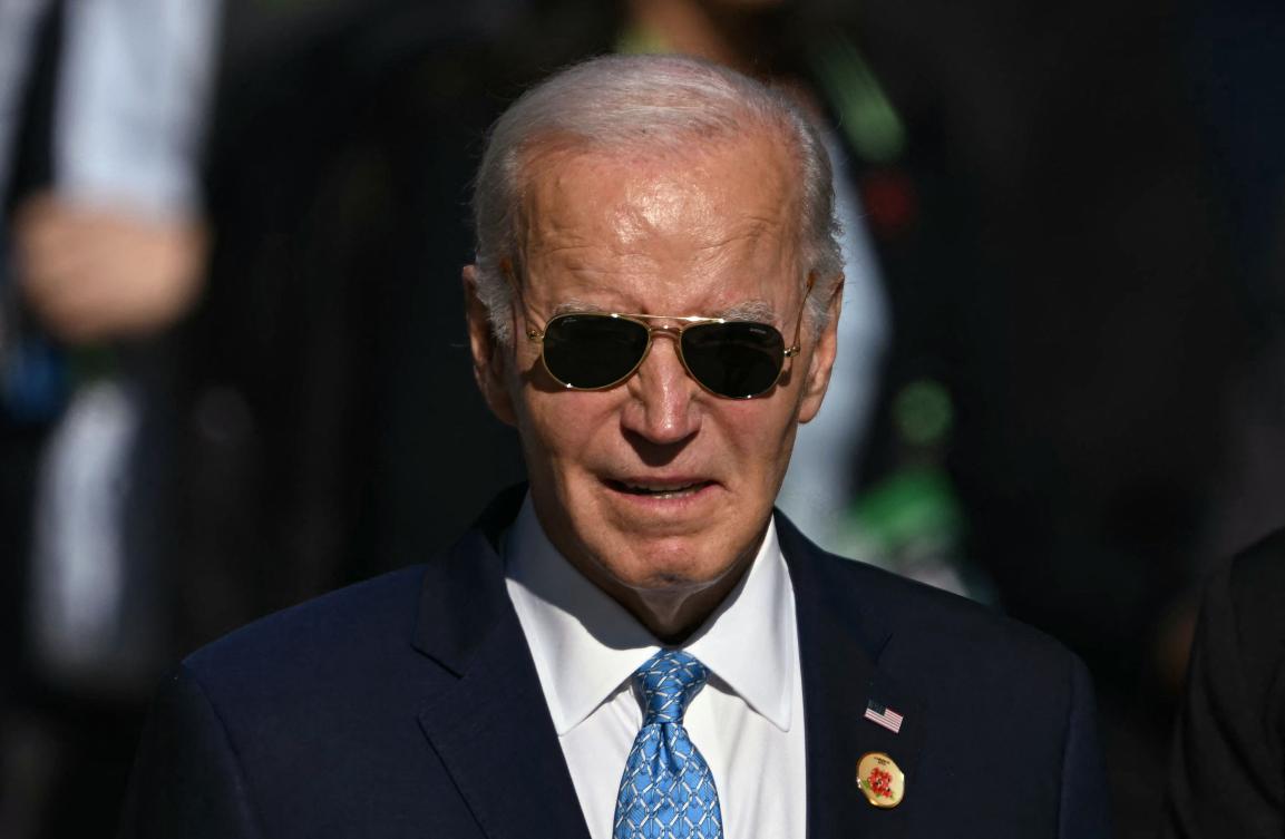 US President Joe Biden is pictured after the group photo at the end of the first session of the G20 Leaders' Meeting in Rio de Janeiro, Brazil, on Nov. 18, 2024. (AFP)