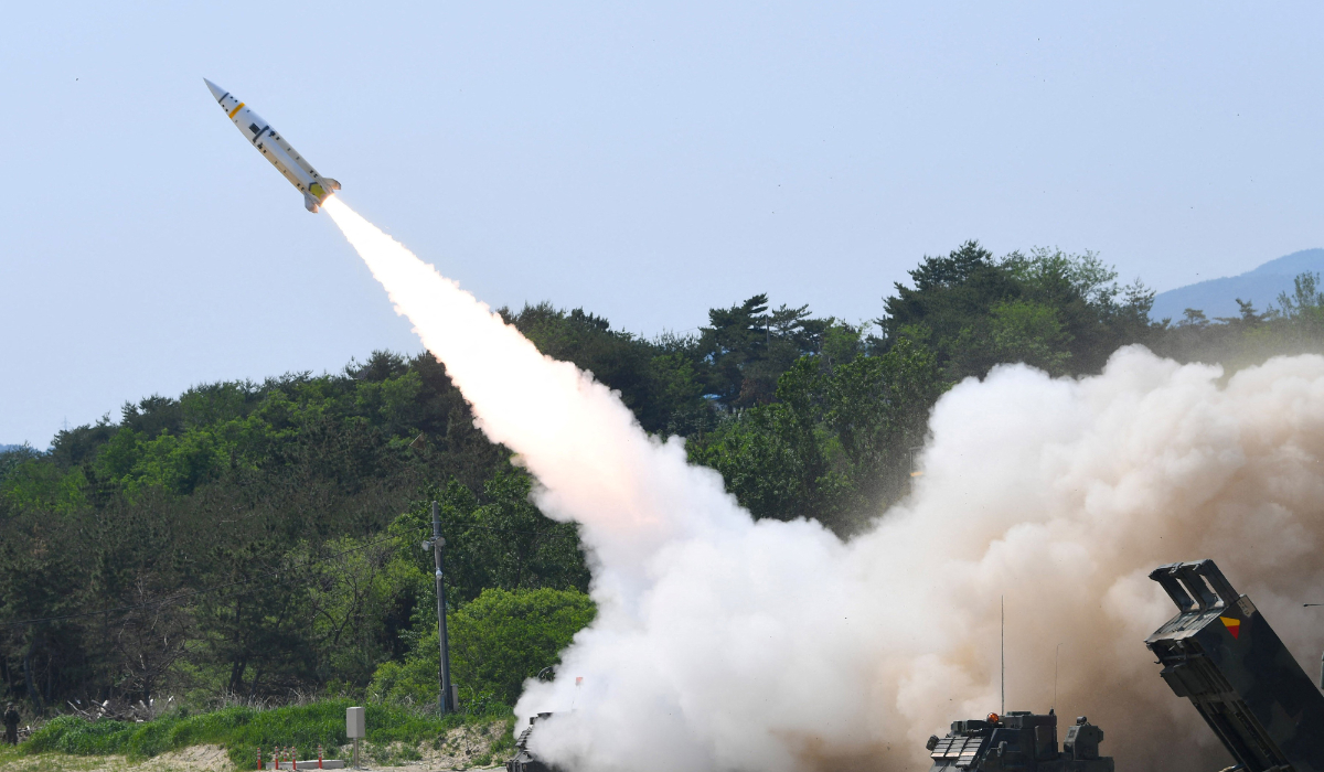 This handout photo taken on May 25, 2022 and provided by the South Korean Defence Ministry in Seoul shows a US Army Tactical Missile System (ATACMS) firing a missile from an undisclosed location on South Korea's east coast during a live-fire exercise aimed to counter North Korea’s missile test. (AFP)