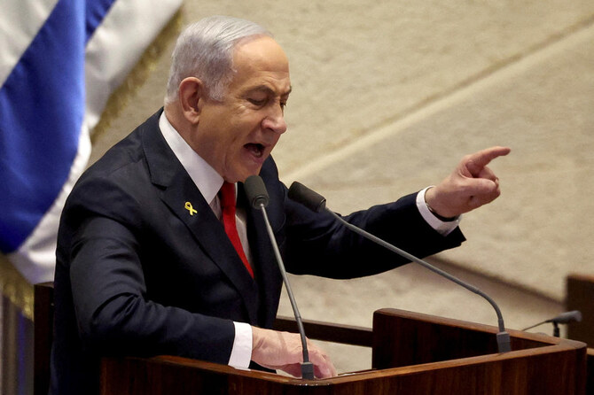 Israeli Prime Minister Benjamin Netanyahu speaks in Israel’s parliament, the Knesset, in Jerusalem on November 18, 2024. (Reuters)