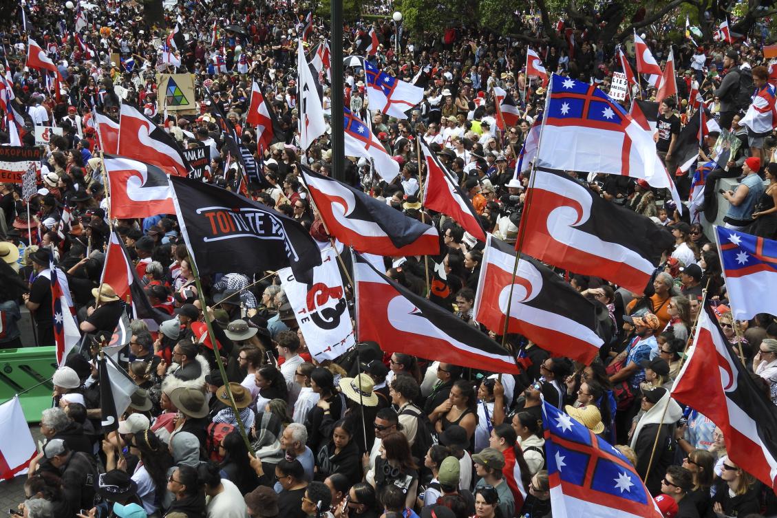 Thousands of people gather outside New Zealand's parliament to protest a proposed law that would redefine the country's founding agreement between Indigenous MÄ'ori and the British Crown, in Wellington. (AP)