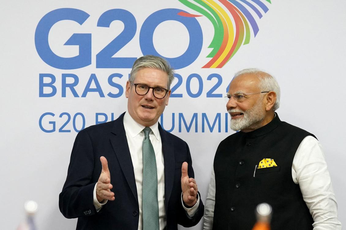 UK’s Prime Minister Keir Starmer (L) and India’s Prime Minister Narendra Modi talk during a bilateral meeting in the sidelines of the G20 summit at the Museum of Modern Art in Rio de Janeiro, Brazil. (AFP)