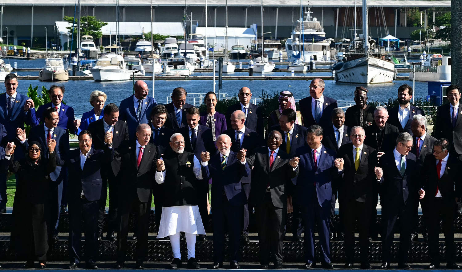 Leaders attending the launch of the Global Alliance Against Hunger and Poverty pose for a group photo after the first session of the G20 Leaders' Meeting in Rio de Janeiro, Brazil, on November 18, 2024. (AFP)