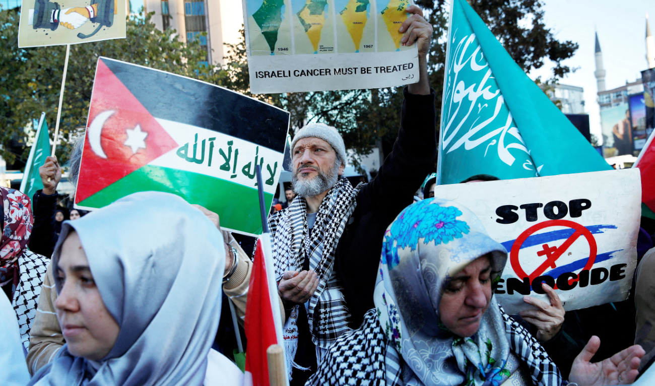 People demonstrate in support of Palestinians in Gaza in this photo taken on Oct. 27 near the Israeli Consulate in Istanbul. (Reuters)
