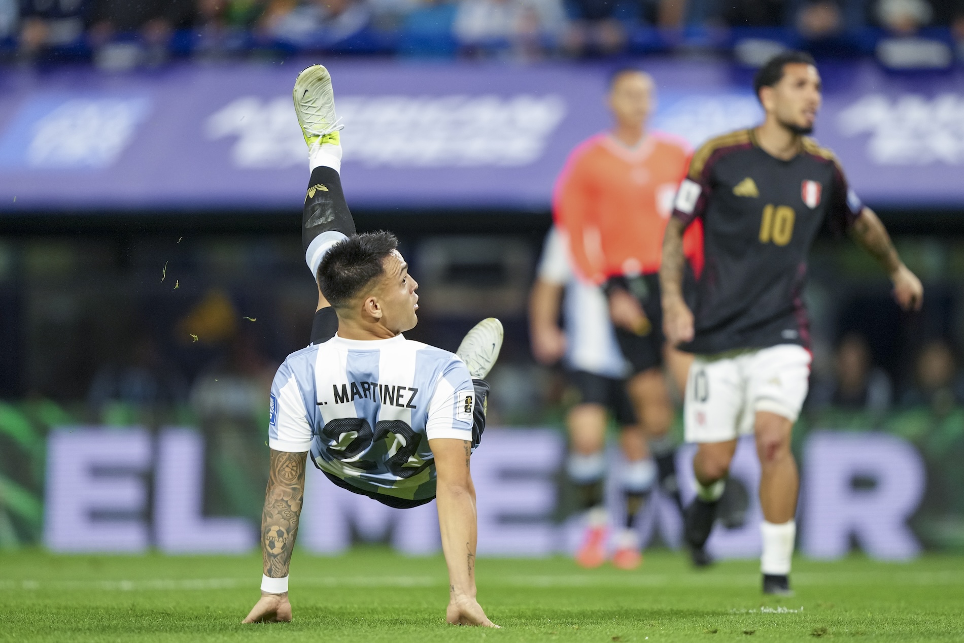 Argentina's Lautaro Martinez scores his side's goal against Peru during a FIFA World Cup 2026 qualifying soccer match at La Bombonera stadium in Buenos Aires, Argentina Tuesday. (AP)