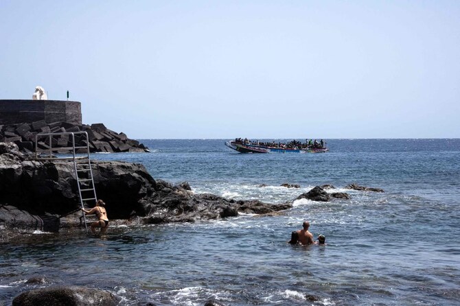 Spain will legalize about 300,000 undocumented migrants a year, starting next May and through 2027, the country's migration minister said Wednesday. (AFP/File)