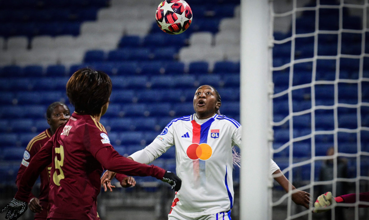 Lyon’s French forward Kadidiatou Diani (R) heads the ball to score her team’s second goal during their UEFA Women’s Champions League Group A football match against AS Roma at the Parc Olympique Lyonnais in Decines-Charpieu, central-eastern France on Nov. 20, 2024. (AFP)