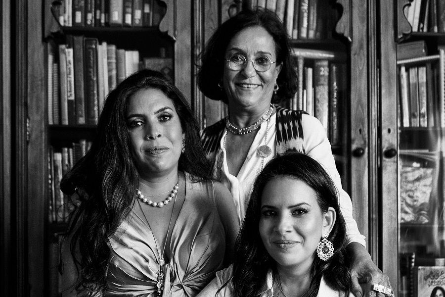 Azza Fahmy (C) and her daughters Fatma (L) and Amina Ghaly. (Supplied)