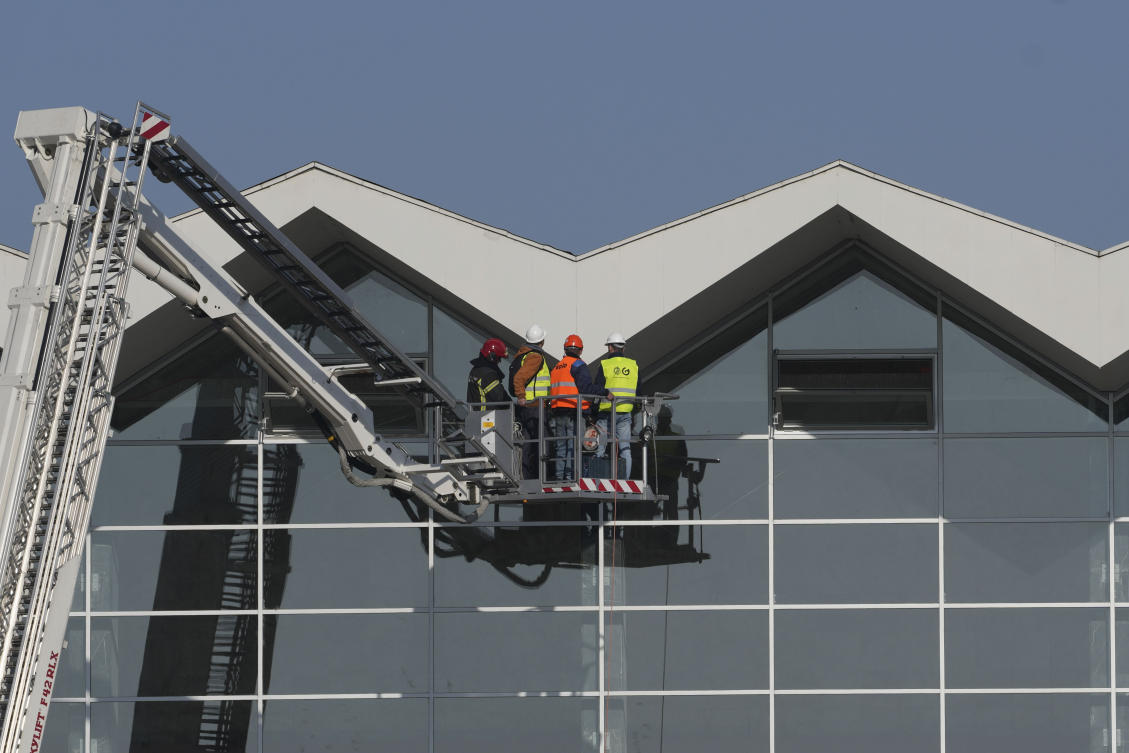 Above, workers inspect a train station after an outdoor roof collapsed in Novi Sad, Serbia on Nov. 2, 2024. (AP)